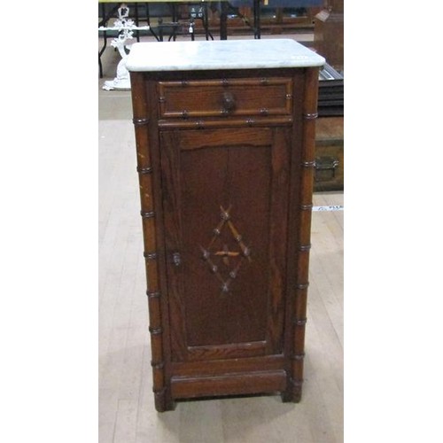 642 - A Victorian pine simulated bamboo marble top pot cupboard, 39cms w, 87cms h.