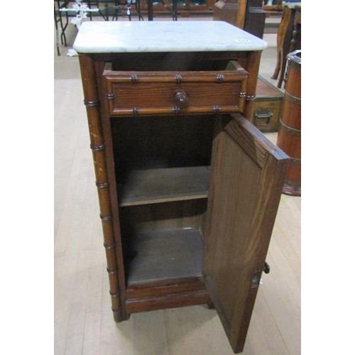 642 - A Victorian pine simulated bamboo marble top pot cupboard, 39cms w, 87cms h.