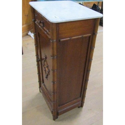 642 - A Victorian pine simulated bamboo marble top pot cupboard, 39cms w, 87cms h.