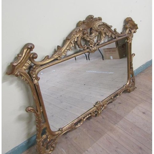 593 - A mid Georgian style gilt wooden stucco overmantel/wall mirror with urn leaf and rose open pediment ... 