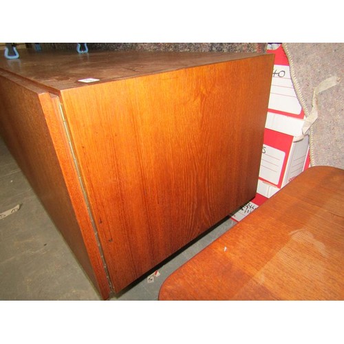 619 - An Ideal Heim teak sideboard of substantial form fitted with six pull-out shelves and one deep drawe... 