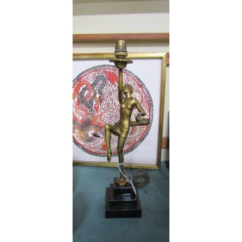 64 - An art deco gilt metal dancing figure table lamp supported on stepped marble base, electrolier.  The... 