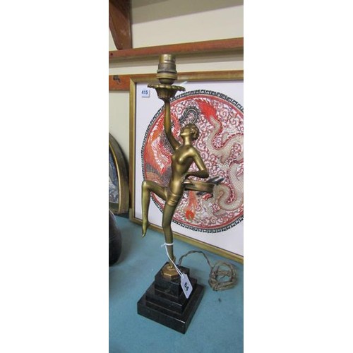 64 - An art deco gilt metal dancing figure table lamp supported on stepped marble base, electrolier.  The... 