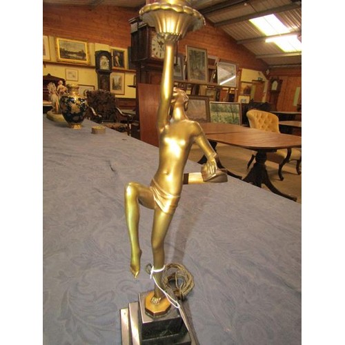 64 - An art deco gilt metal dancing figure table lamp supported on stepped marble base, electrolier.  The... 