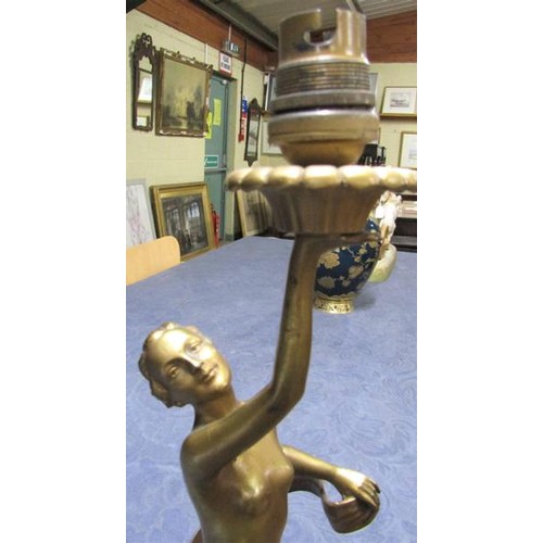 64 - An art deco gilt metal dancing figure table lamp supported on stepped marble base, electrolier.  The... 