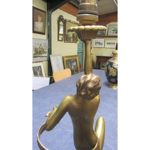 64 - An art deco gilt metal dancing figure table lamp supported on stepped marble base, electrolier.  The... 