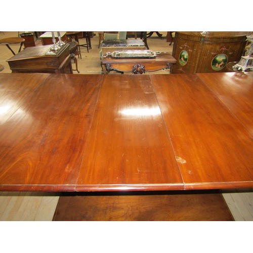 587 - A Victorian mahogany extending dining table, the table top with moulded edge having deep frieze and ... 