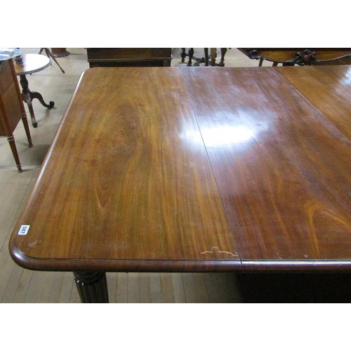 587 - A Victorian mahogany extending dining table, the table top with moulded edge having deep frieze and ... 