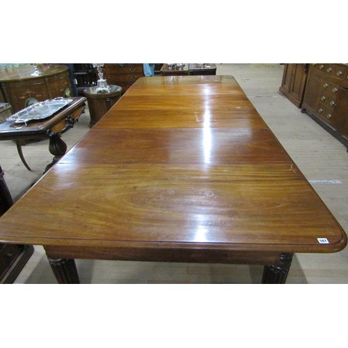 587 - A Victorian mahogany extending dining table, the table top with moulded edge having deep frieze and ... 