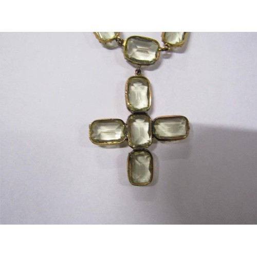 182 - A gilt metal yellow Beryl set necklace with pendant cross, together with a brooch.  Necklace 36cms l... 