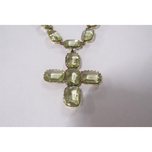 182 - A gilt metal yellow Beryl set necklace with pendant cross, together with a brooch.  Necklace 36cms l... 