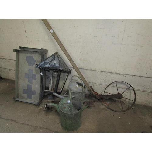 1210 - TWO WATERING CANS; LANTERN; ALUMINIUM CRATES; PLOUGH