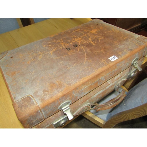 1295 - VINTAGE LEATHER SUITCASE, BOOKS, SMALL RUG ETC.