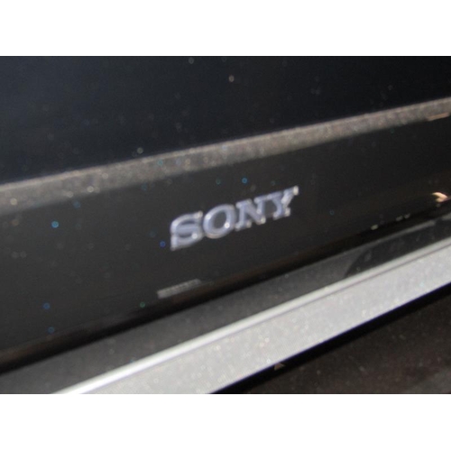 1322 - SONY TV; VIDEO PLAYER; STAND