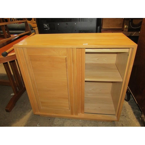 1328 - ERCOL BLONDE OAK CUPBOARD