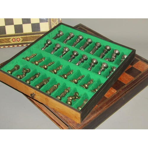 1624 - LEATHER BOUND CHESS BOARD WITH CAST METAL PIECES TOGETHER WITH AN INLAID BOARD - 40CMS SQ