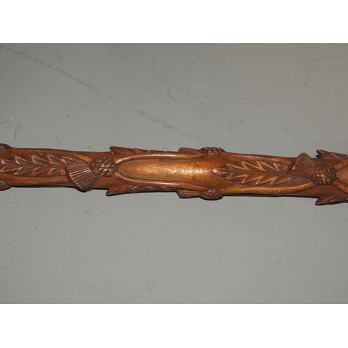 1641 - LATE VICTORIAN/EDWARDIAN CARVED WALKING CANE WITH SILVER KNOP HANDLE CARVED WITH THISTLE 87cms L