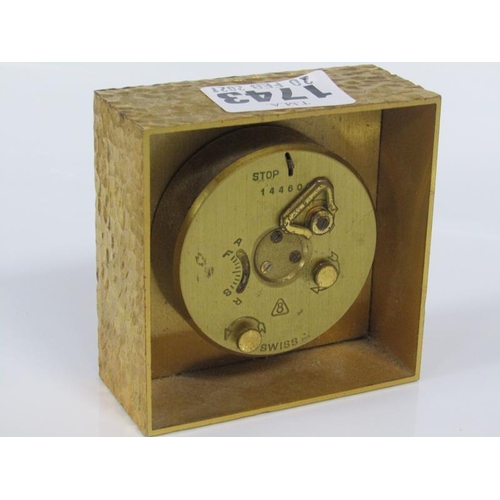 1743 - IM HOF BEDROOM ALARM CLOCK WITH SWISS MOVEMENT IN A GILT METAL CASE 7.5cms SQ