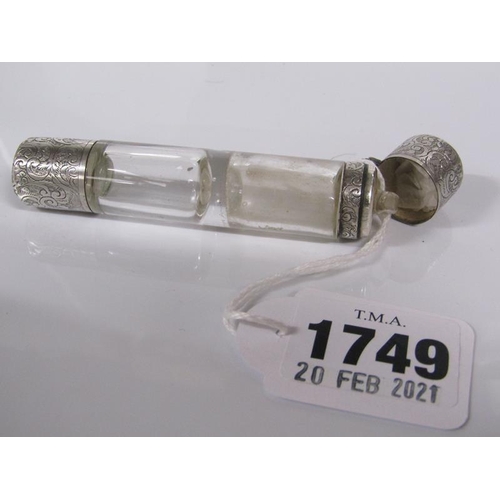 1749 - DOUBLE ENDED CLEAR GLASS SCENT BOTTLE WITH SILVER TURN OFF AND HINGED COVER 9.5cms L