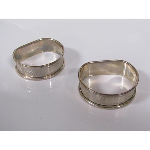 1757 - TWO PAIRS OF SILVER NAPKIN RINGS