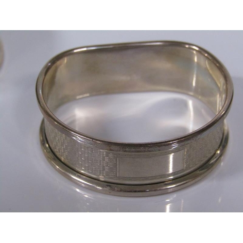 1757 - TWO PAIRS OF SILVER NAPKIN RINGS