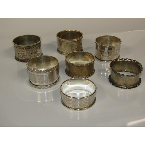 1778 - COLLECTION OF SEVEN SILVER NAPKIN RINGS 4.5oz