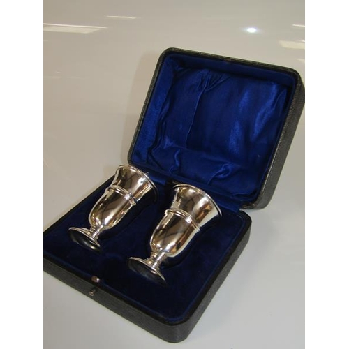 1779 - PAIR OF SILVER PEPPERS, EACH 8cms H IN PRESENTATION BOX