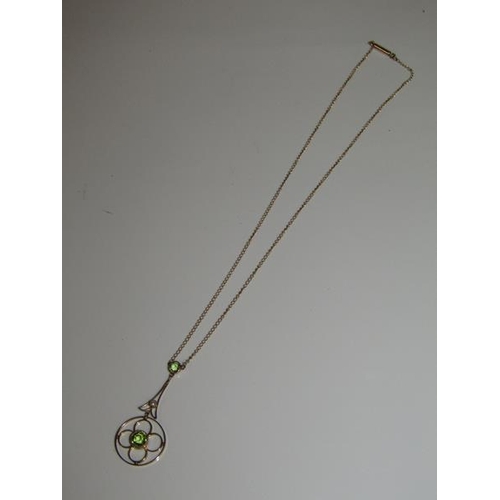 1798 - 9ct GOLD PERIDOT AND SEED PEARL SET PENDANT AND CHAIN