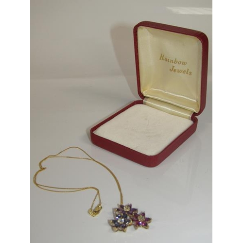 1815 - GOLD AMETHYST SET FLORAL PENDANT AND CHAIN