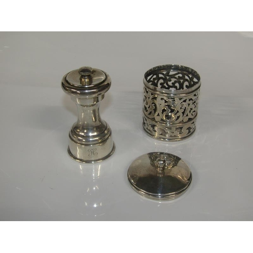 1822 - SILVER PIERCED CYLINDRICAL POT AND COVER AND ONE CAPSTAN SILVER PEPPER MILL - 9cms H