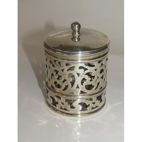 1822 - SILVER PIERCED CYLINDRICAL POT AND COVER AND ONE CAPSTAN SILVER PEPPER MILL - 9cms H