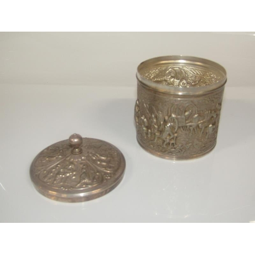 1824 - SILVER BACKED HAND BRUSH TOGETHER WITH CONTINENTAL SILVER EMBOSSED CYLINDRICAL BOX AND COVER - 10cms... 