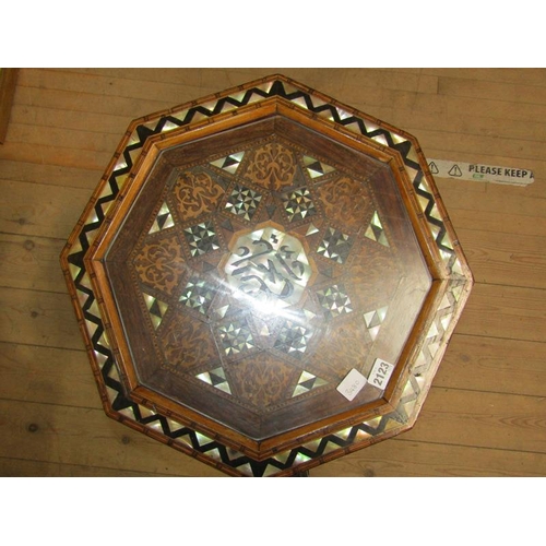 2123 - PERSIAN MOTHER OF PEARL AND EBONY INLAID MARQUETRY OCTAGONAL TABLE ON ARCHED FRAME 47 X 52cms