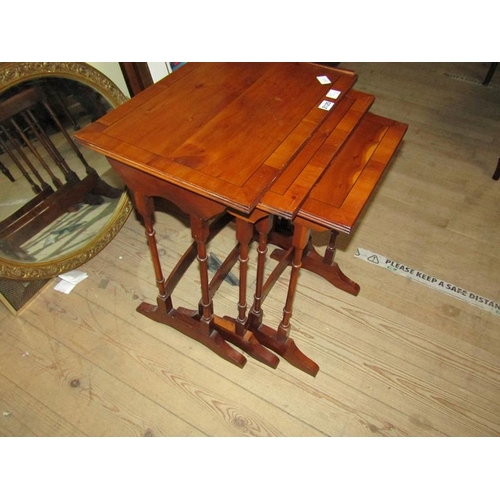 2125 - NEST OF THREE YEW WOOD OCCASIONAL TABLES LARGEST 50 x 56cms