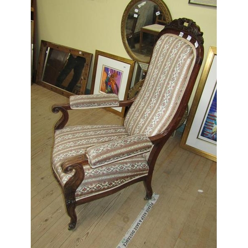 2133 - 19c MAHOGANY CARVED SHOW FRAMED AND UPHOLSTERED OPEN ARMCHAIR WITH SCROLLING ARMS ON CASTORS 116cms ... 