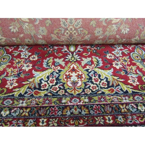 2137 - PERSIAN WOOLLEN RED AND FAWN GROUND CARPET OF FLORAL PATTERN - 289cms W