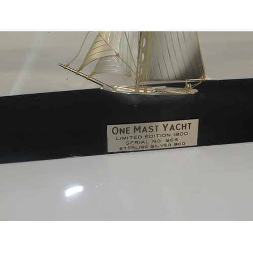 1903 - STERLING SILVER MODEL OF A ONE MAST YACHT SET IN A PERSPEX BLOCK, YACHT 11CM H, BLOCK 19.5CM H