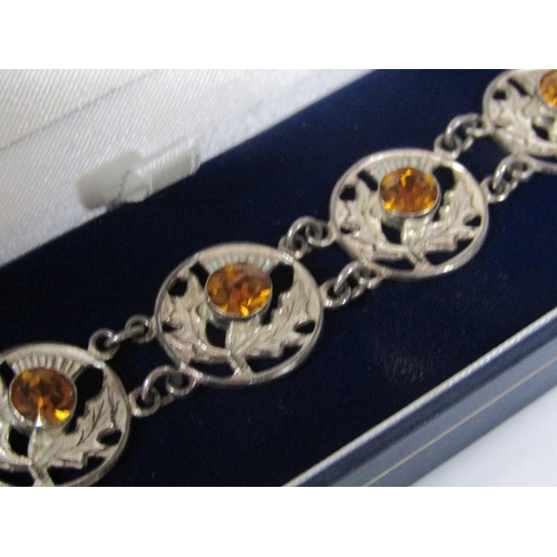 1922 - SCOTTISH SILVER BRACELET TOGETHER WITH TWO PLATED SCOTTISH BROOCHES TOGETHER WITH CAINGORN STONES