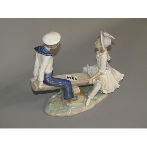 2044 - LLADRO PORCELAIN FIGURE GROUP - GIRL AND BOY ON SEASAW, 26CM W