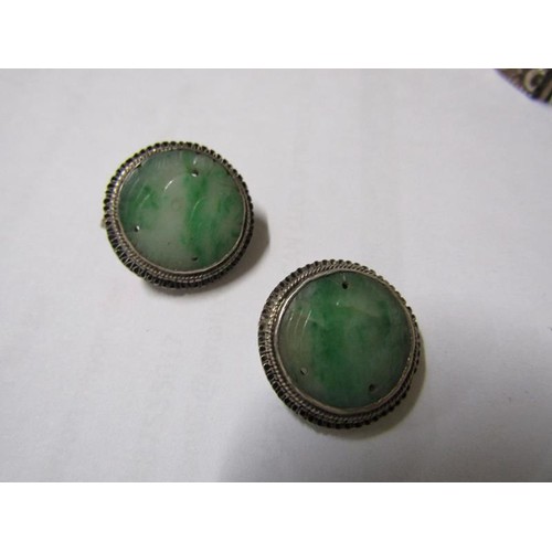 1885 - PAIR OF CHINESE CARVED JADE MOUNTED BROOCHES; SILVER BRACELET