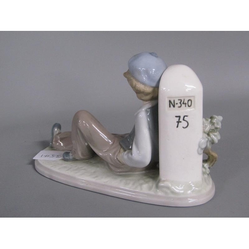 2053 - LLADRO PORCELAIN FIGURE - YOUNG TRAVELLER RESTING, 12.5CM H