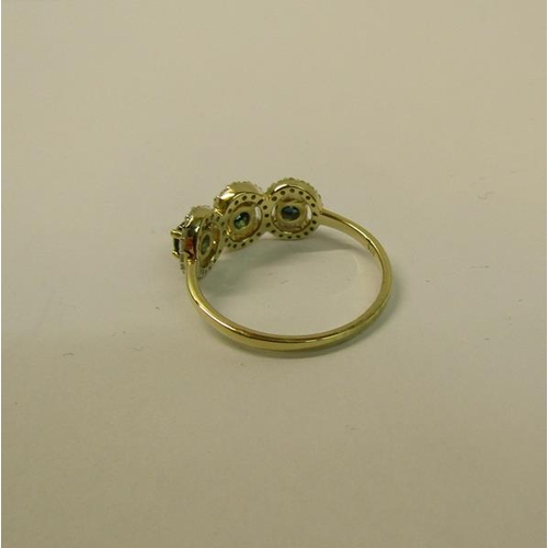 104 - Gold three stone ring set with blue and white diamonds - ring size appx S