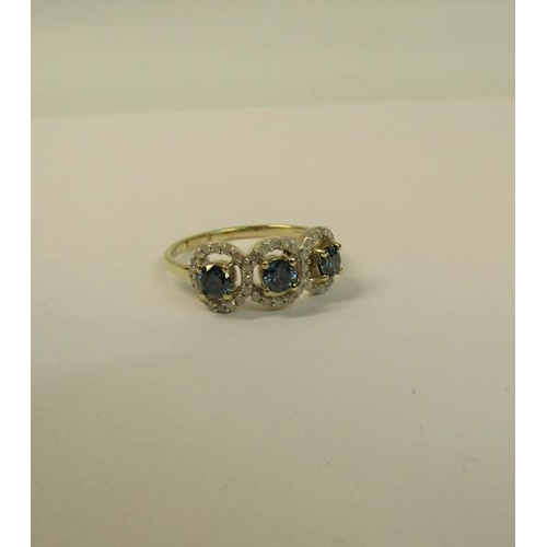 104 - Gold three stone ring set with blue and white diamonds - ring size appx S