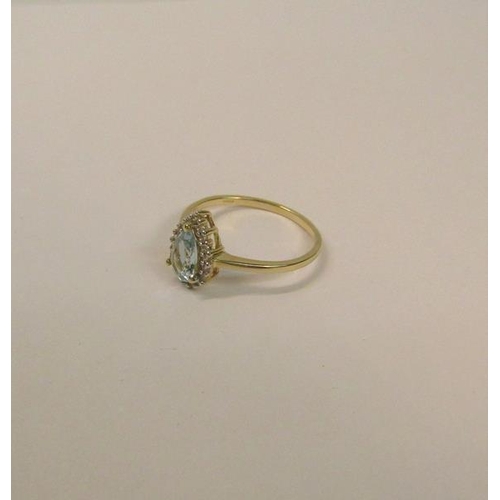 106 - 9ct gold ring set with a pear shaped Aquamarine - ring size appx S