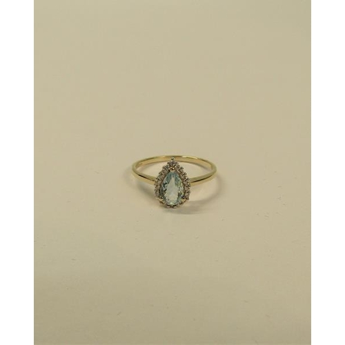 106 - 9ct gold ring set with a pear shaped Aquamarine - ring size appx S