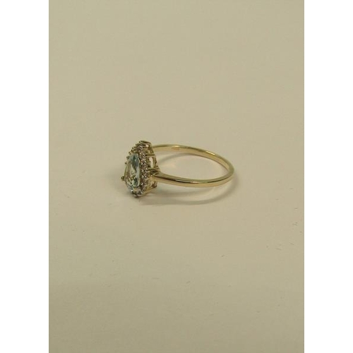 106 - 9ct gold ring set with a pear shaped Aquamarine - ring size appx S