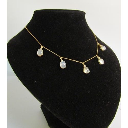 113 - An 18ct yellow gold necklet with Moonstone and diamond droplets