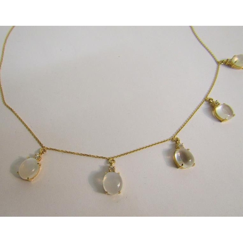 113 - An 18ct yellow gold necklet with Moonstone and diamond droplets