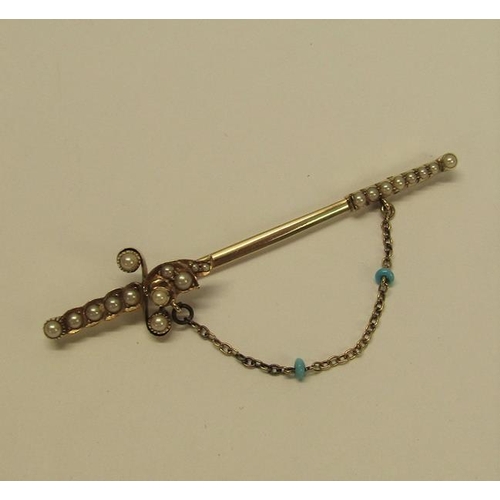 131 - A gold (not tested) pin brooch set with seed pearls and turquoise bead to the chain, 5.9g overall, 7... 