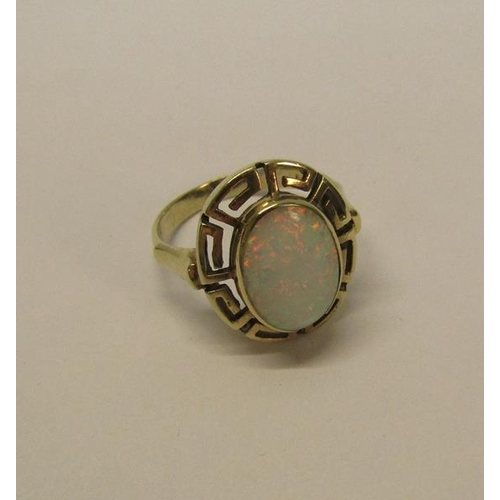 139 - A 14ct gold opal set ring, 5.7g overall, size P.